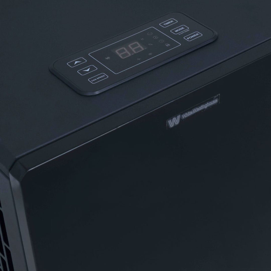 White Westinghouse WDE 100 dehumidifier by JET INDIA, 100 liters per day, shown in a modern room setting.