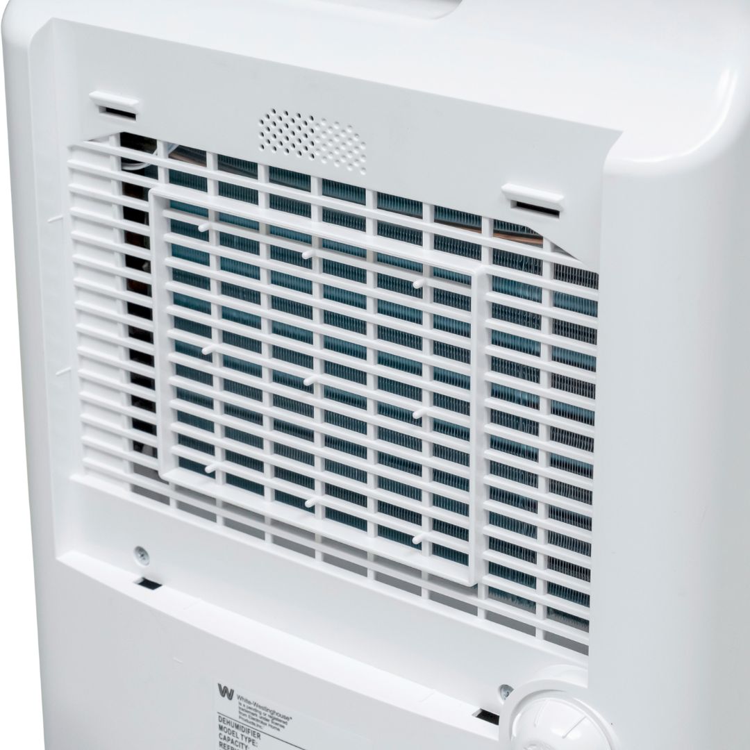 White Westinghouse AWHD-20L dehumidifier by JET INDIA showing a sleek appliance with digital controls and water collection tank.